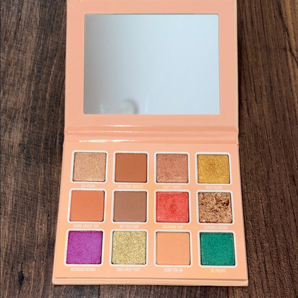 Vibrant Eyeshadow Palette with Gold, Purple, and Green Shades